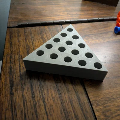 Trò chơi cắm chốt tam giác (Triangle Peg Board Game)