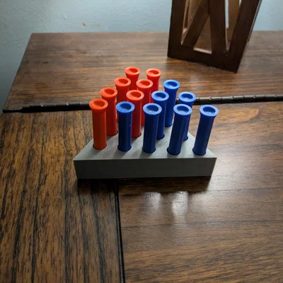 Trò chơi cắm chốt tam giác (Triangle Peg Board Game)