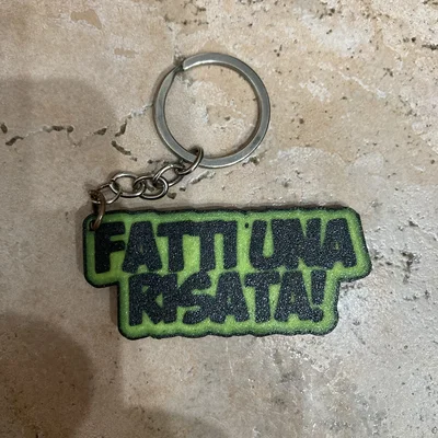 Móc khóa in 3D thông điệp vui nhộn Fatti una risata