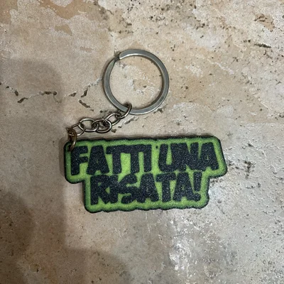 Móc khóa in 3D thông điệp vui nhộn Fatti una risata