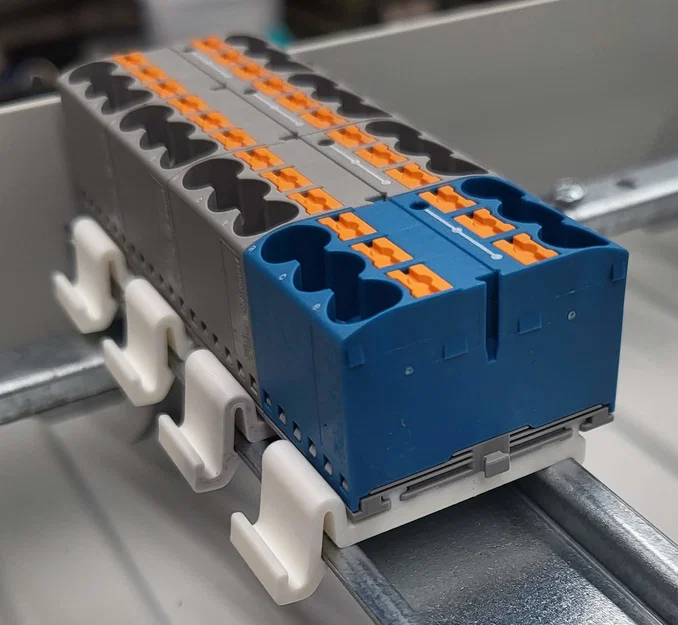 Ngàm gắn 3D cho khối phân phối điện PTFIX 6x10 trên DIN Rail 35mm - Image 1