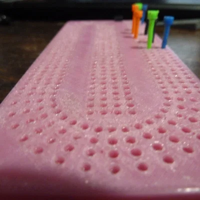 Bảng chơi bài Cribbage (Cribbage Board)