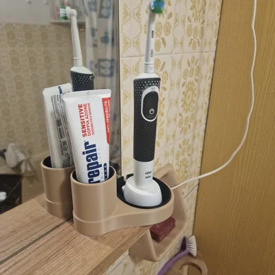 Giá đỡ bàn chải Oral-B kèm ngăn đựng kem đánh răng