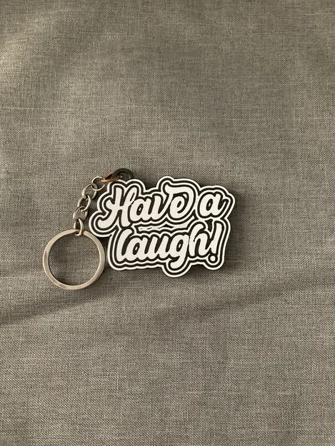 Móc khóa thông điệp "Have a Laugh" - Phụ kiện 3D ý nghĩa - Image 1