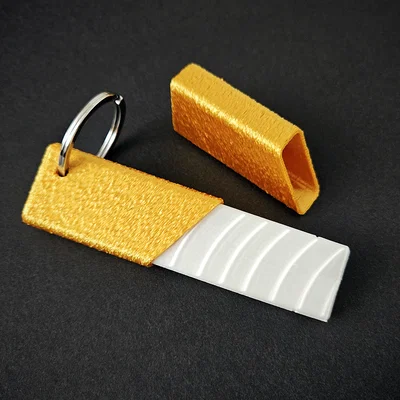 Móc khóa hình thanh cá tẩm bột (Fish finger keychain)