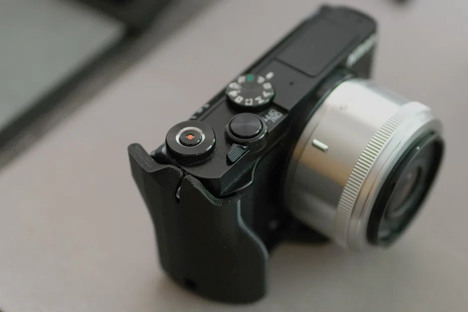 Grip mỏng gọn kèm đế Tripod cho Nikon 1 J5 - Image 1