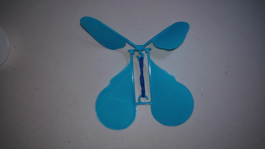 Đồ chơi bướm bay bất ngờ chạy bằng dây thun - Image 5