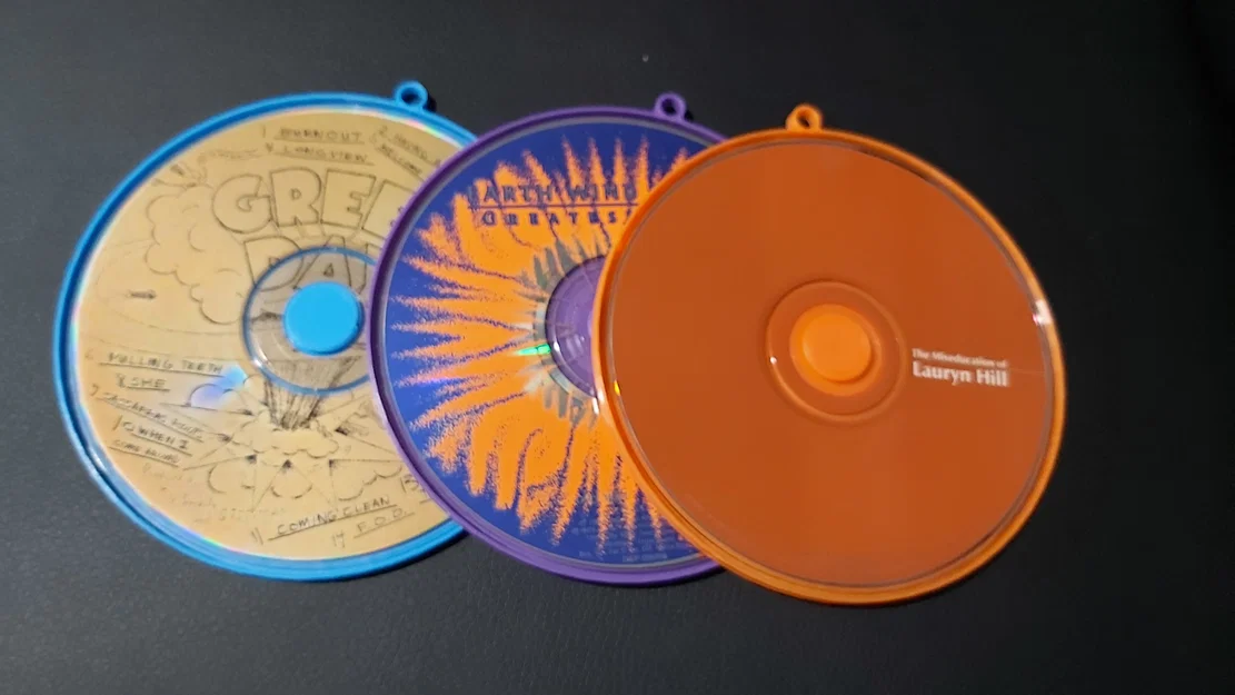 Hộp Đựng Đĩa CD/DVD Siêu Mỏng Có Khóa Xoay Tiện Dụng - Image 2