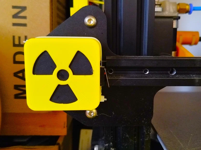 Nắp che động cơ bước X cho Ender-3 (kiểu cảnh báo phóng xạ) - Image 1