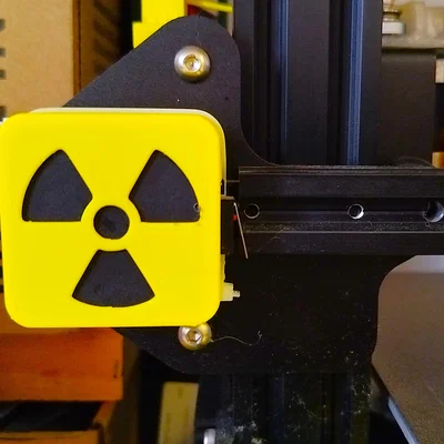 Nắp che động cơ bước X cho Ender-3 (kiểu cảnh báo phóng xạ)