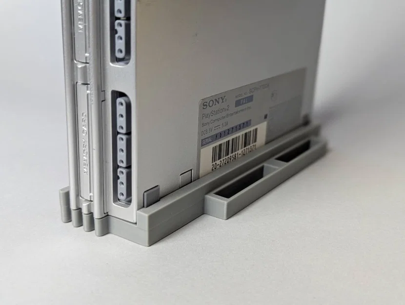 Chân đế dựng đứng Sony PlayStation 2 Slim - Image 1
