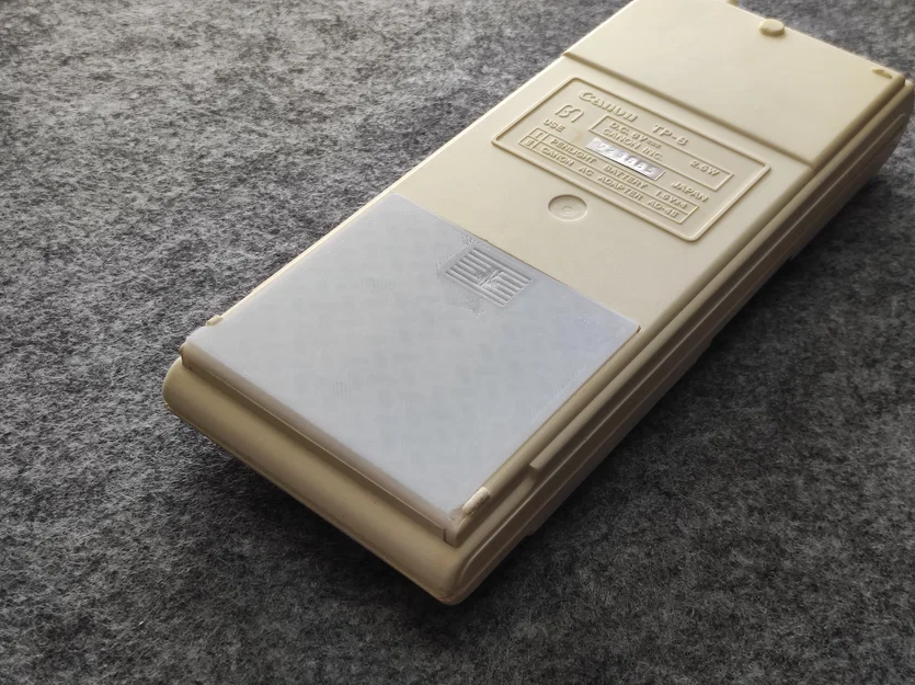 Nắp Đậy Pin Canon TP-8 - Giải Pháp Thay Thế Cho Máy Tính Cổ - Image 1