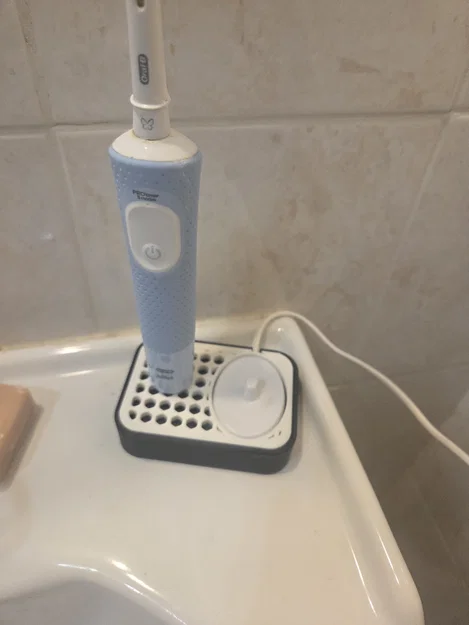 Đế cắm và sạc bàn chải điện Oral-B - Image 1