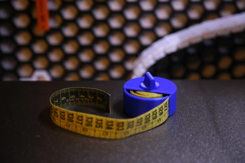 Dụng cụ cuộn thước dây (Tape Measure Winder) - Image 1