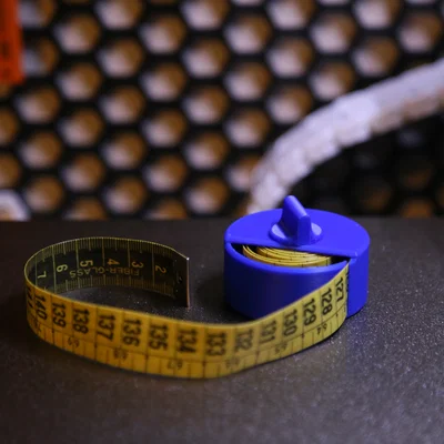Dụng cụ cuộn thước dây (Tape Measure Winder)