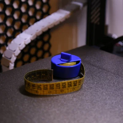 Dụng cụ cuộn thước dây (Tape Measure Winder)