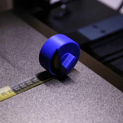 Dụng cụ cuộn thước dây (Tape Measure Winder)