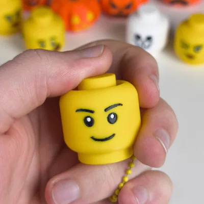 Móc khóa Lego Head Fidget Clicker