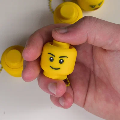 Móc khóa Lego Head Fidget Clicker