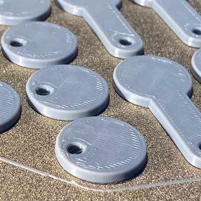 Token mở khóa xe đẩy siêu thị Úc $2 (Aldi, Woolworths, Coles, Kmart, Target...)