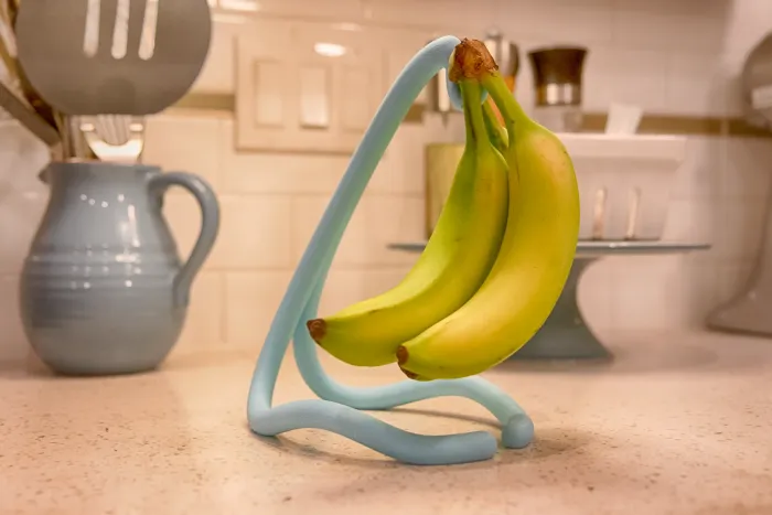 FlowFrame Banana Cradle - Kệ treo chuối nghệ thuật hiện đại - Image 1