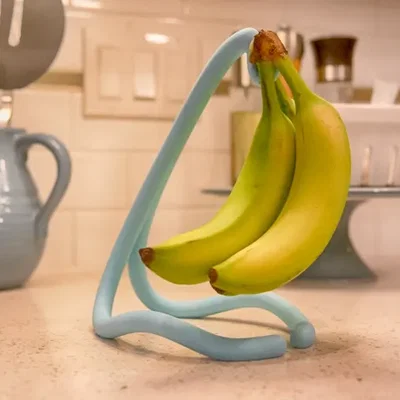 FlowFrame Banana Cradle - Kệ treo chuối nghệ thuật hiện đại