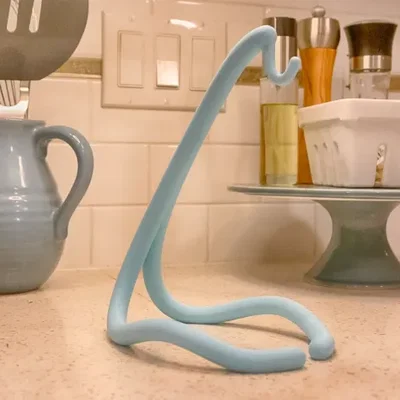 FlowFrame Banana Cradle - Kệ treo chuối nghệ thuật hiện đại