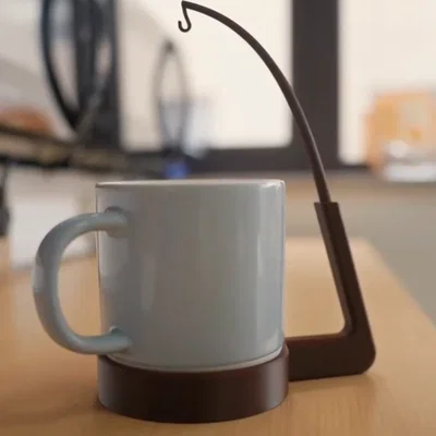 Giá đỡ túi trà 3D hình cần câu độc đáo tiện lợi