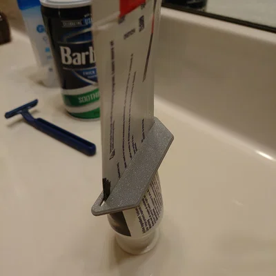 Dụng cụ ép tuýp kem đánh răng 3D (Toothpaste Squeeze) tiện lợi