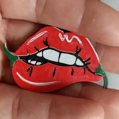 Móc khóa hình đôi môi cay (llavero de labio picante) độc đáo