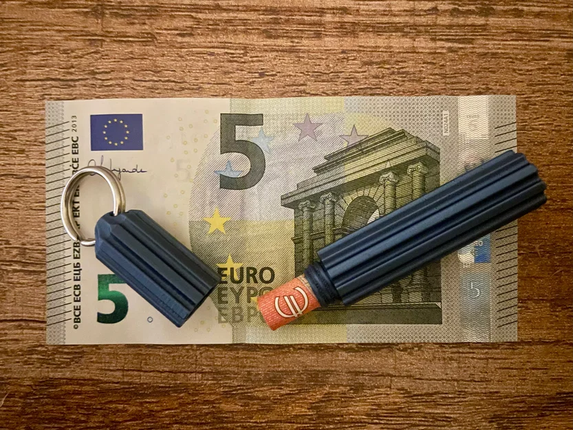 Móc khóa kiêm ống đựng tiền bí mật - Thiết kế 3D tiện lợi - Image 1