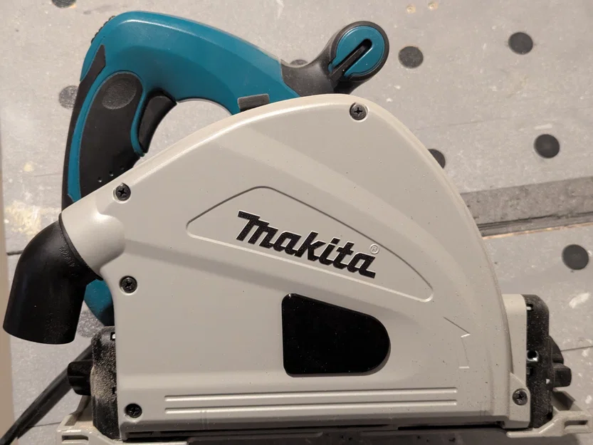 Nắp che bụi lỗ thay lưỡi cưa cho máy Makita SP6000 - Image 1