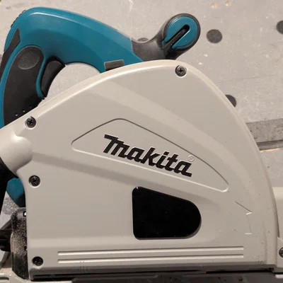 Nắp che bụi lỗ thay lưỡi cưa cho máy Makita SP6000