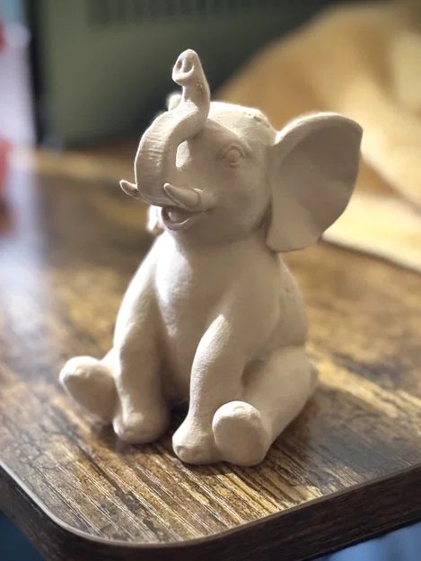 Tượng chú voi ngồi với họa tiết hoa văn tinh xảo - Image 1