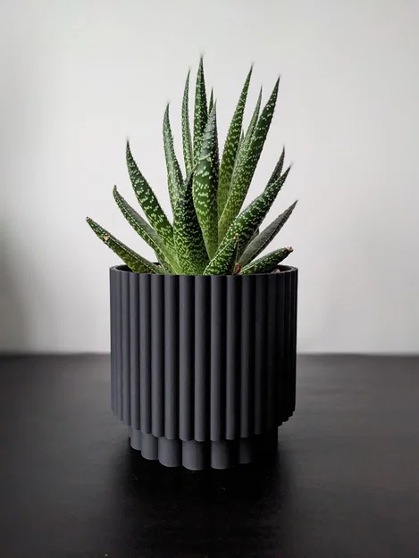 Chậu cây Roller Planter - Thiết kế Twist and Snap - Image 1