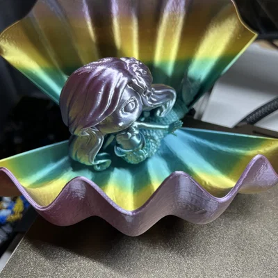 Nàng tiên cá khớp nối cùng vỏ sò (Articulated Mermaid with Shell)