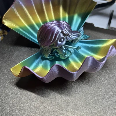 Nàng tiên cá khớp nối cùng vỏ sò (Articulated Mermaid with Shell)