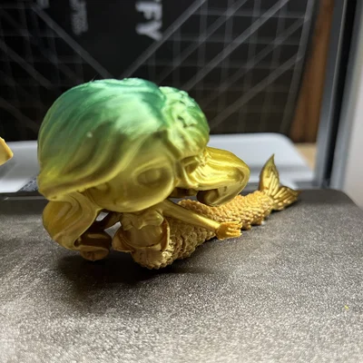 Nàng tiên cá khớp nối cùng vỏ sò (Articulated Mermaid with Shell)
