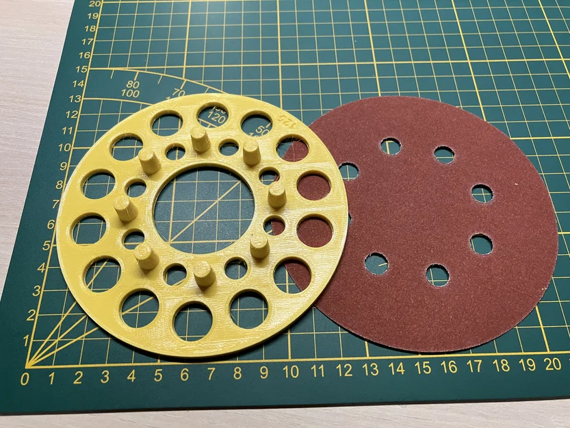 Dụng cụ hỗ trợ dán đĩa chà nhám (Orbital sander disk applicator) - Image 1