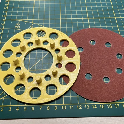 Dụng cụ hỗ trợ dán đĩa chà nhám (Orbital sander disk applicator)