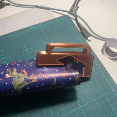 Dụng cụ cắt giấy gói quà V1/V2