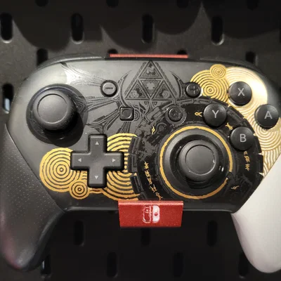 Giá treo tay cầm Nintendo Switch Pro trên bảng Skadis