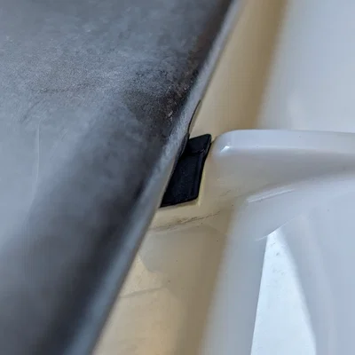 Đệm đỡ cánh gió sau R34 GTR