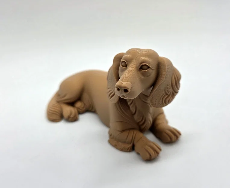 Mô hình chú chó Dachshund lông dài đang nằm - Image 2