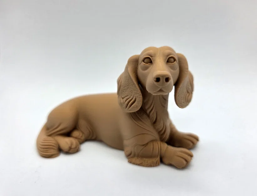 Mô hình chú chó Dachshund lông dài đang nằm - Image 5