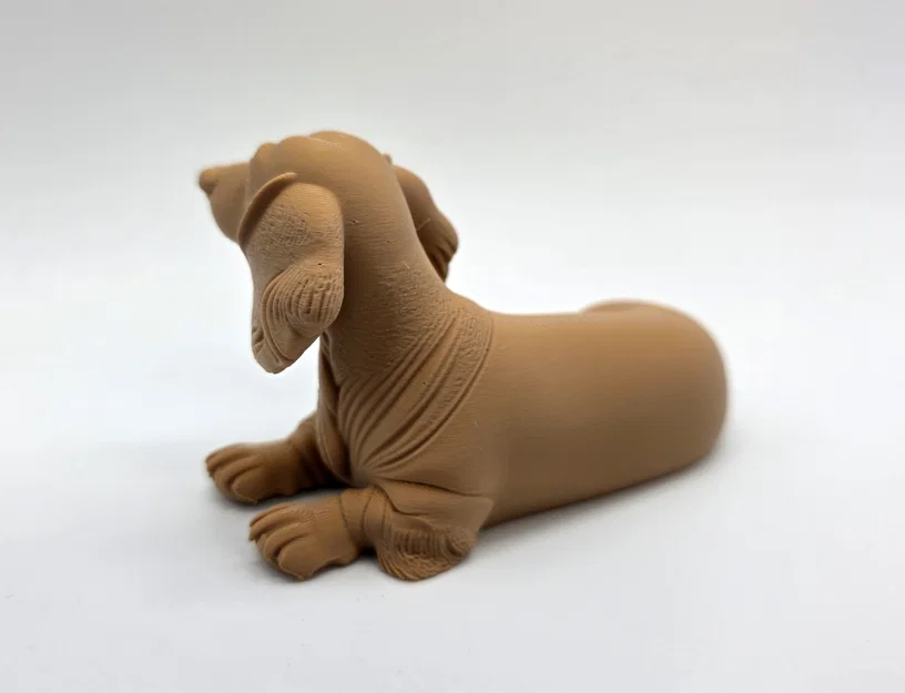 Mô hình chú chó Dachshund lông dài đang nằm - Image 7