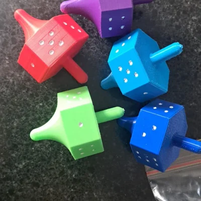 Xúc xắc con quay (Spinning top Dice)