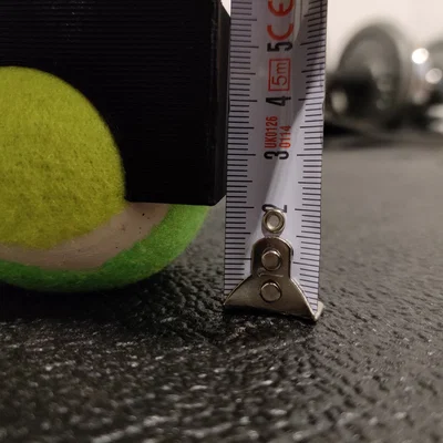 Chân đế bập bênh dùng bóng tennis cho Wahoo Kickr V5