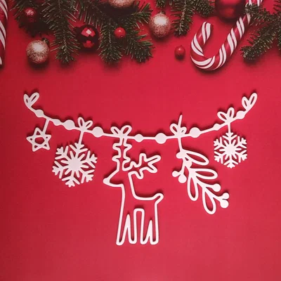 Dây treo trang trí Giáng sinh với người tuyết, tuần lộc và bông tuyết