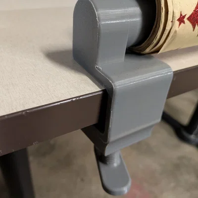 Dụng cụ gắn bàn giữ cuộn giấy gói quà